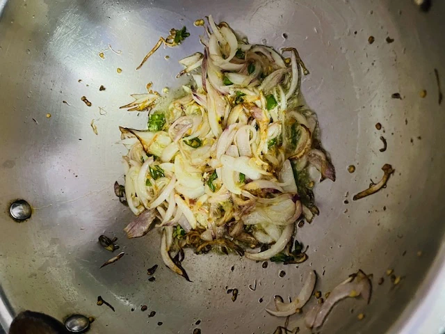 cook onions and green chilies until they golden brown