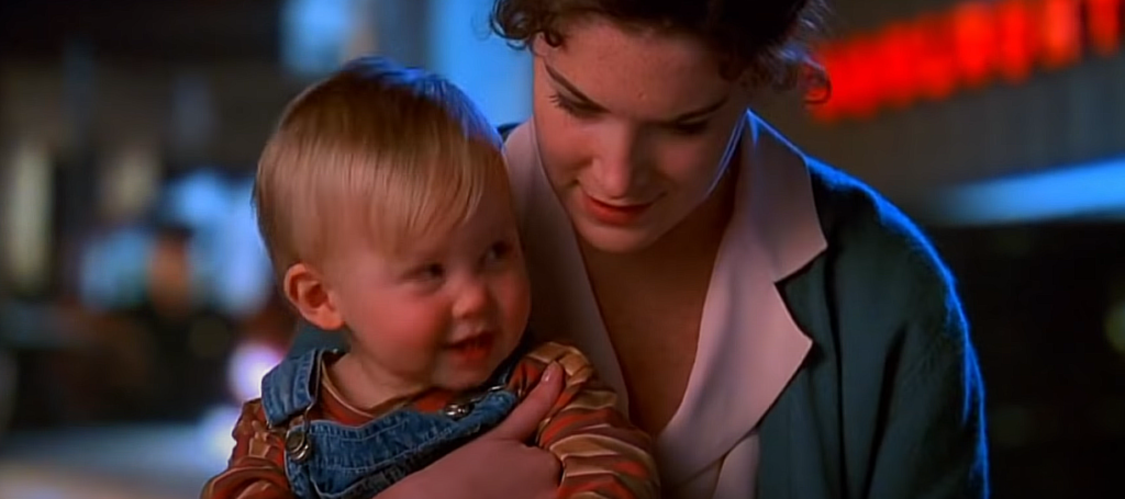 Baby's Day Out  movie scene - mother holding baby